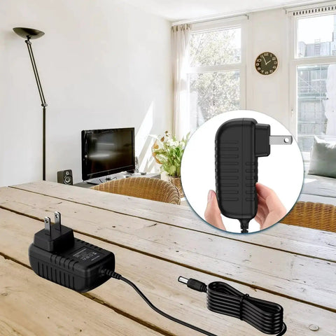 9V AC DC Power Adapter For ProForm 750R Magnetic Foldable Rowing Machine Plug And Play Compatible With PFRW58118 9V DC Power Supply Cord Charger Worldwide 100 240V Input shown on a table with focus on plug and cord.