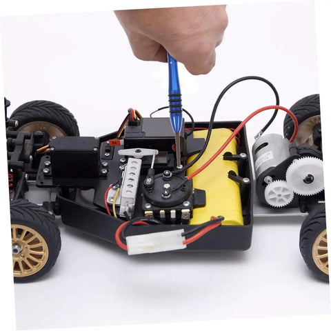 Person using RC Car Screws And Fasteners Kit Pro Grade Repair Tool Set With Wrench Nuts Bolts And Case for maintenance