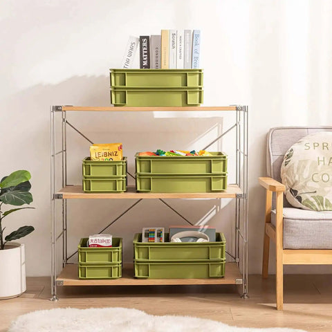 Heavy Duty Stackable Plastic Storage Bin For Kitchen, Bathroom, Office And Camping, Multi Purpose Organizer Tote, Undersink Cabinet Storage, Built To Last With Reinforced Edges, Green 2L And 2S on shelf with books and items