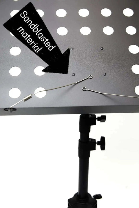 Close-up of folding music stand with sandblasted desk material, part of the Folding Music Stand Portable With One Step Setup And Tool Free Height Adjustment