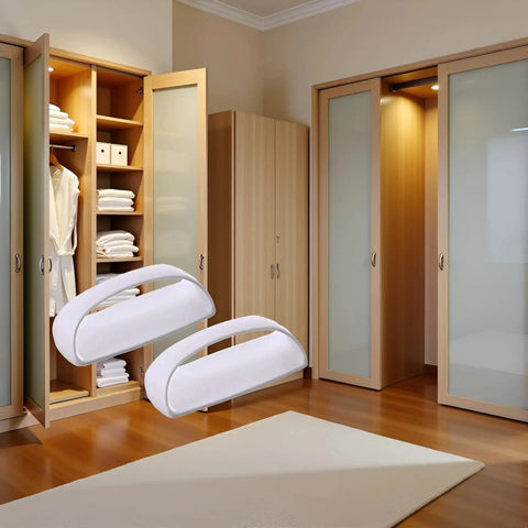 Two Pack White Adhesive Handles Self Stick Wardrobe And Cabinet Pulls installed on sliding wardrobe doors in a modern bedroom