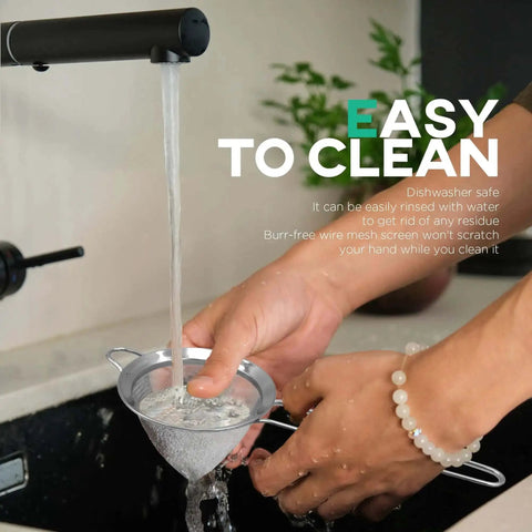 3.3 Inch Fine Mesh Strainer 304 Stainless Steel Cocktail Sieve being washed under a tap, showing ease of cleaning in kitchen environment.