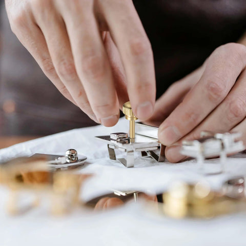 Installing a 304 stainless steel flat knurled head screw, part of the M5x16mm Knurled Thumb Screws, 5 Pack, in an electronic device.