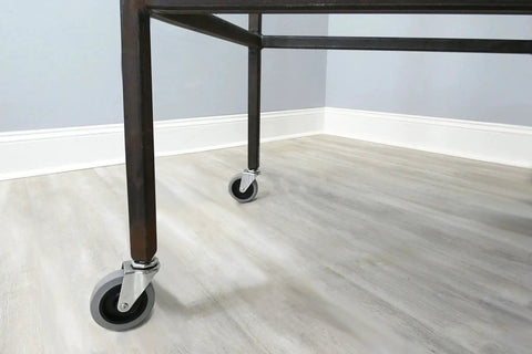 3-Inch Swivel Stem Caster With Non-Marking TPR Rubber Wheel on furniture leg, installed view in room