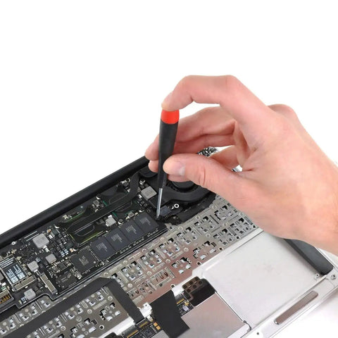 Hand using screwdriver to secure components in laptop with 360Pcs Multisize Laptop And PC Replacement Screw Kit With M2 M2.5 And M3 Hardware For Lenovo Dell HP Sony Asus Acer Toshiba Gateway Samsung And More For SSD M.2 And Case Mounting For Your PC Build.