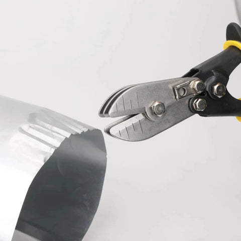 Five Blade Sheet Metal Crimper For Ductwork Downspouts And Stove Pipes Industrial Grade Heavy Duty Hand Crimping Tool in use on metal pipe