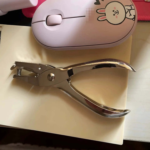 Circle Hole Punch Kit With One Quarter And One Eighth Inch Sizes Handy Handheld Puncher on desk with pink mouse
