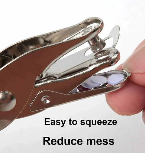 Close-up of a One Quarter Inch Circle Hole Punch, Metal Handheld Paper Punch with soft grip, showing paper disc collection feature.