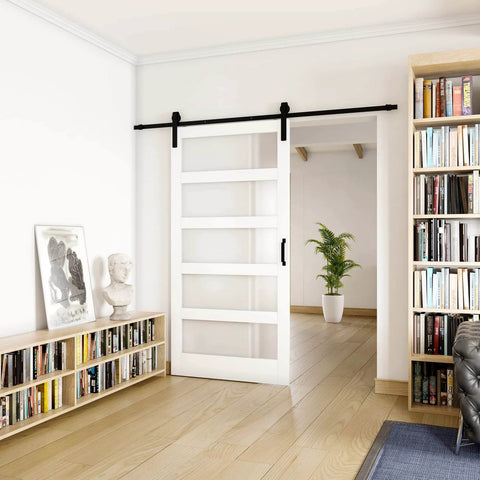 42 Inch By 84 Inch Five Panel Sliding Barn Door With Tempered Frosted Glass installed in a modern living room interior