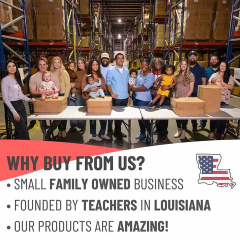 Group of diverse people standing behind tables in a warehouse with boxes, promoting a small family-owned business founded by teachers.
