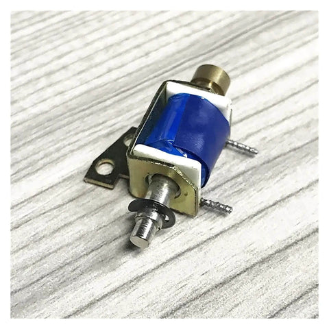 12V DC Solenoid Electromagnet Push Pull Type with 3mm Mounting Hole and 0.12 Inch Clearance on wood surface