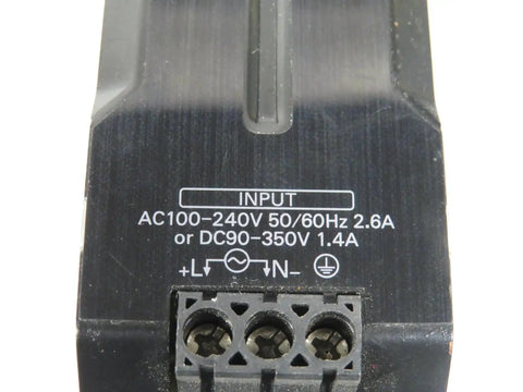 Close-up of DIN Rail Power Supply 120W 24V DC 5A Enclosed Switch Mode With Adjustable Output 100 240VAC Input Industrial Grade Used But Working Compact Aluminum Enclosure Beefy Build input terminals and voltage markings.