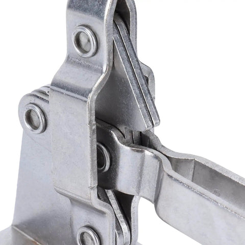 Close-up of a stainless steel Quick Release Toggle Clamp For Jigs And Workbenches With Plastic Handle Guard Fast Clamping
