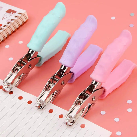 Colorful blue metal hole punch with soft grip handle for DIY crafts and scrapbooking, cuts clean 1/4 inch holes, punches up to 5 sheets.
