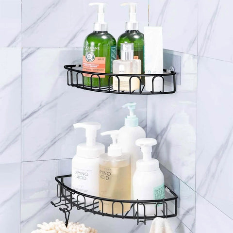 Bathroom corner shelves with shampoo, lotion bottles, and soap on tiled wall