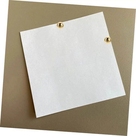 White paper pinned with brass tacks from 200Pcs DIY Craft Nails For Wall Hangings And Scrapbooking Kit With Miniature Tacks Decor Brads