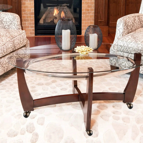 Glass coffee table with wooden frame featuring 1.5 Inch Ball Caster Stem Wheel With Sockets, Vintage Antique Swivel Caster For Furniture Like Coffee Tables And Cabinets, Durable PP And Steel Construction With Antique Gold Finish, Quiet Rolling Wheels, Pack Of 4 in living room setting.