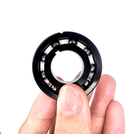 High Efficiency Turbine Bearing Replacement For Navigator Pool Vacuum Cleaners AXV055P 4 Pack being held for detail view