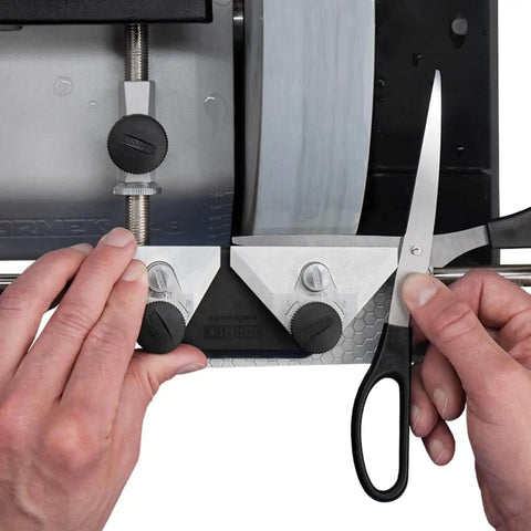 Hands using Pro-Grade Scissors Sharpening Jig With 60 Degree Angle For Fast, Precise Sharpening On Your Sharpening System