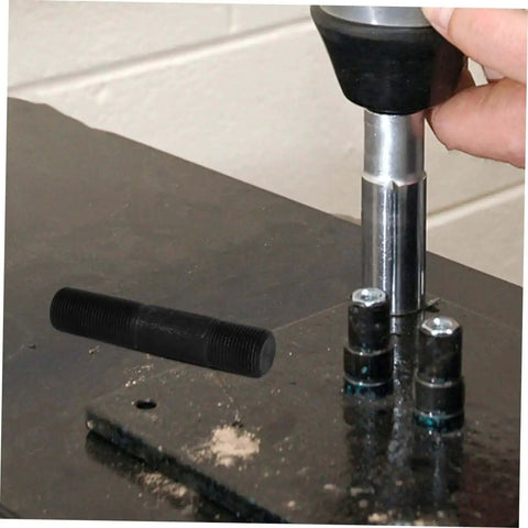Using the Hydraulic Punch Driver Kit Knockout Tool for electrical conduit and metal sheet punching on a workbench.