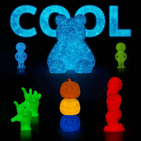 Glow In The Dark Shiny Firefly Blue 1.75Mm PLA Filament models glowing in dark with letters, bear, and assorted shapes.