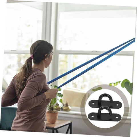 Woman using resistance bands connected to stainless steel wall mount exercise strap anchors 3 pack for resistance bands heavy duty safety