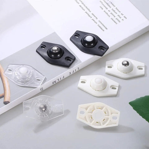 Self Adhesive Caster Wheels Set 24 Pieces With 360 Degree Swivel Mini Caster Rollers shown in black and white on a book surface