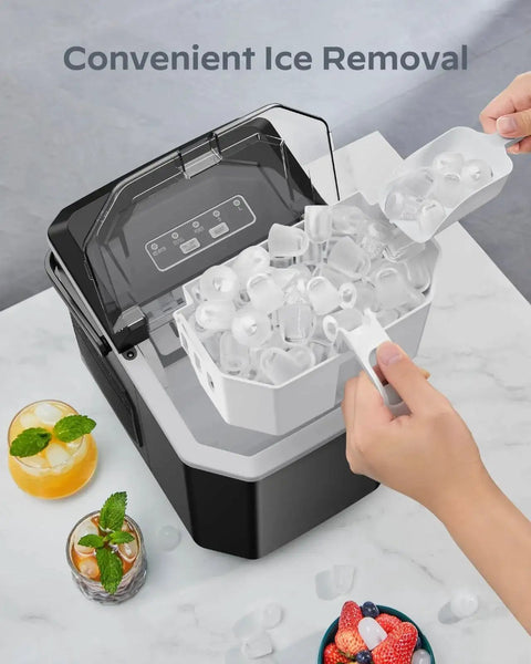 Countertop Ice Maker Portable 9 Cubes In 6 Minutes Self Cleaning Basket And Scoop with ice being removed