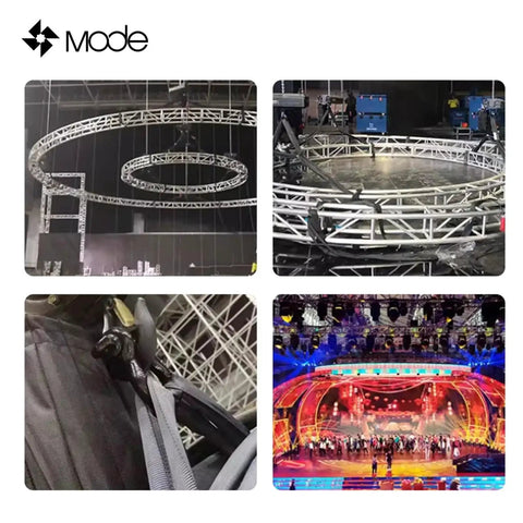 Mode black heavy-duty polyester lifting slings and straps used with circular truss rigging — front view
Mode black heavy-duty polyester lifting slings around a large circular truss — side view
Close-up of Mode black polyester lifting sling fabric with reinforced stitching and hardware
Installed stage rigging scene with Mode slings and truss, colorful lighting
