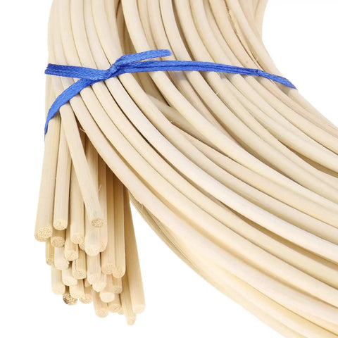 Close-up of Round Reed Spline 350 Ft Roll 0.14 Inch tied with blue string for DIY furniture and basket weaving.
