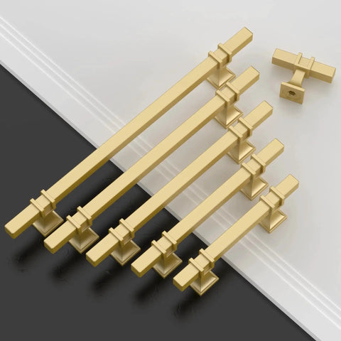 10 Pack Brushed Gold Cabinet Knobs 1.46 Inch 37mm Single Hole Rectangle Drawer Pulls, shown in a diagonal layout on a double-colored surface.