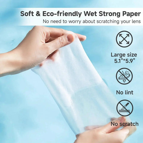 Hands holding a large premoistened anti-fog lens wipe, emphasizing soft and eco-friendly material, designed for glasses and screens.