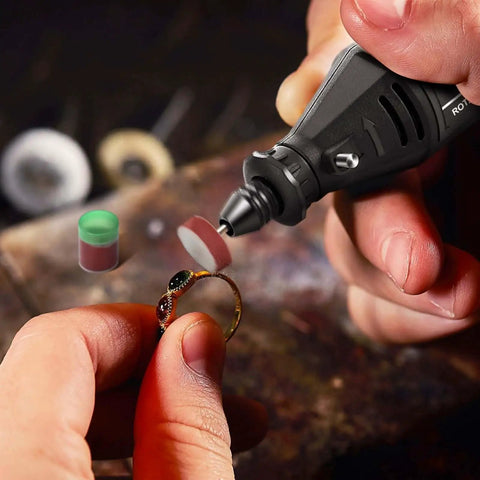 Versatile Rotary Tool Kit With Keyless Chuck And Flex Shaft used for polishing jewelry with included accessories.
