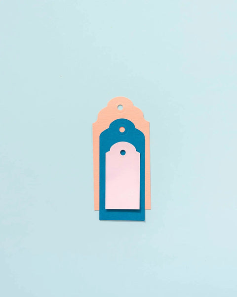 Stacked tags created using 3-In-1 Round Tag Punch For Crafting And Scrapbooking, Multi Color Tool That Lets You Create Gift Tags.