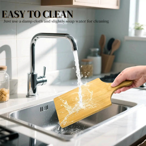 Washing a bamboo cutting board with handle under a kitchen sink faucet, showcasing cleaning ease, part of 12 Pack Bamboo Cutting Boards With Handles 11 By 5 Inch Mini Charcuterie Boards For Kitchen Prep And Serving Blank Laser Engraving Surface Bulk Food Platter Partyware Eco Friendly Gift For Home Decor And Housewarming.