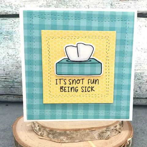 Greeting card with tissue box and 'It's snot fun being sick' text, made using Clear Stamp And Die Set For Card Making And Scrapbooking With Carbon Steel Dies And TPR Stamp Material Easy To Use On Any Acrylic Block For Embossing And Photo Album Decor Durable Non Yellowing Go To Craft Supplies For Card Makers