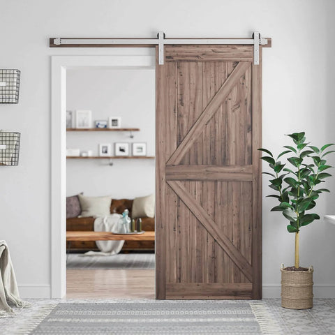Brushed Nickel Barn Door Hardware Kit For 36 Inch Wide Doors Heavy Duty Sliding Track With Quiet Operation Easy To Install 6 Feet Rail System J Shape Hanger Fits 36 Inch Door Smooth And Durable Frame For Home Interior, installed view showcasing wooden door with brushed nickel hardware.