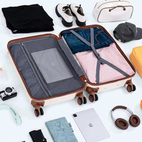 Open suitcase from Road Ready Five Piece Luggage Set With Wheels Featuring Durable ABS Hard Shell TSA Lock And Smooth Spinner Wheels by Cosbarn.