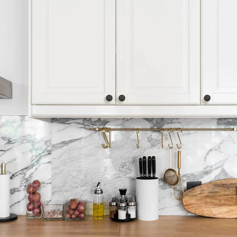 Ten Pack One And One Quarter Inch Matte Black Round Cabinet Knobs Zinc Solid Drawer Pulls For Cabinets in modern kitchen setting