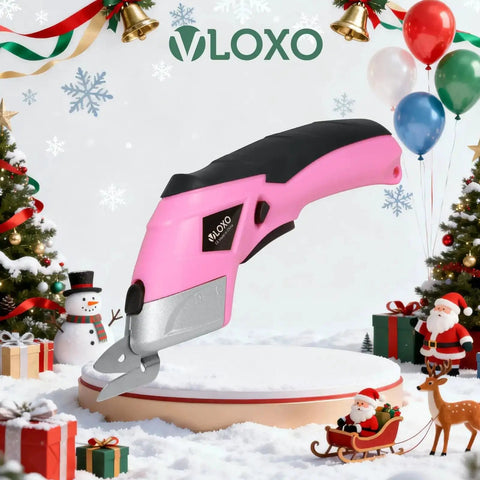 Cordless Electric Scissors For Cardboard And Fabric With Two Blade Types, pink, on festive platform with decorations