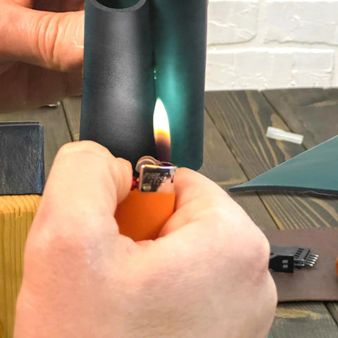 Testing heat resistance of Large 23.6 Inch By 118 Inch ESD Soldering Mat Roll For Desk And Workbench Anti Static Grounding Pad