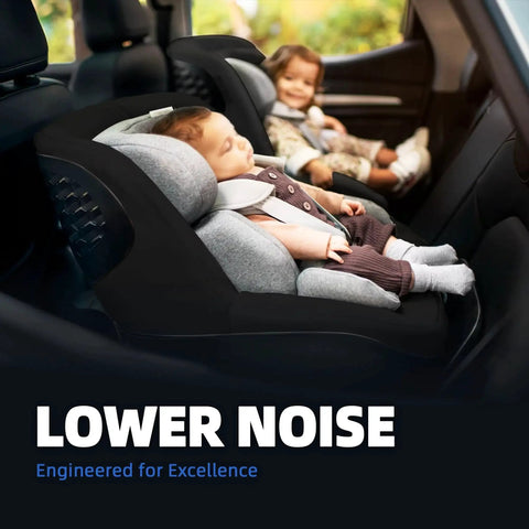 Two babies seated in car seats inside a car highlighting lower noise feature for enhanced comfort and safety.