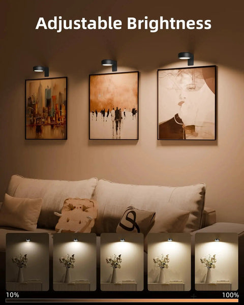 Rechargeable Picture Light With 3 Color Temperatures 12 RGB Colors And Remote illuminating framed art in living room.
