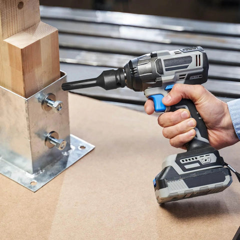 One Half Inch Drive Torx T60 Bit Socket For Impact Tools 6 Point Star Socket being used on power drill in a workshop
