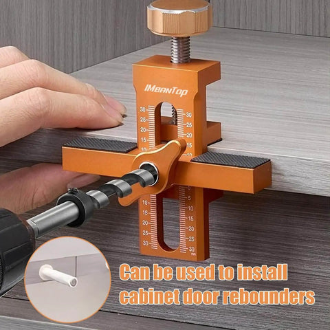 2-In-1 Cabinet Door Mounting Jig and Rebound Tool with drill bits, orange aluminum alloy, for frameless cabinet installations.