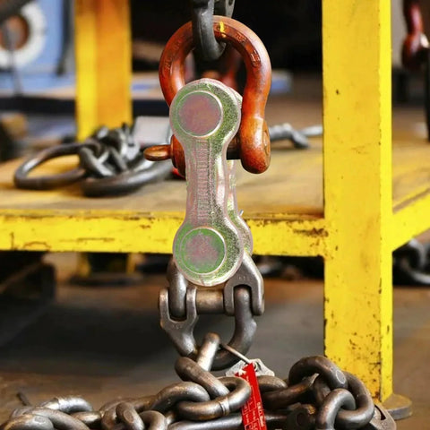 8 Pack 3/8 Inch Twin Clevis Link Zinc Plated G70 Forged Chain Repair Links for truck and trailer tie downs, shown in industrial setting.