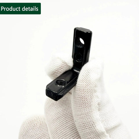 Gloved hand holding black corner bracket from 30 Sets 2020 Aluminum Extrusion Hardware Connectors With Screws And Wrench