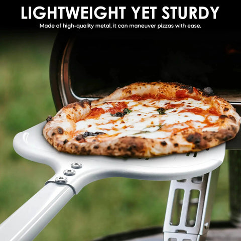 12 Inch Aluminum Perforated Pizza Peel With Lightweight Slotted Design lifting pizza from outdoor oven