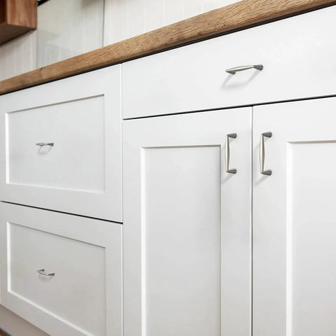 10 Pack Brushed Satin Nickel Cabinet Pulls With 3 Inch Hole Centers Solid Handles installed on white kitchen cabinets
