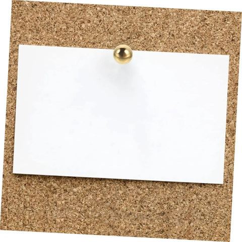 Corkboard with a note pinned using a brass tack from the 200Pcs DIY Craft Nails For Wall Hangings And Scrapbooking Kit.